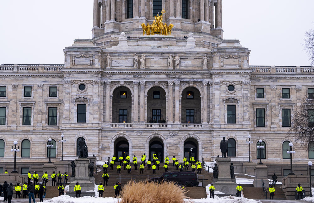 Minnesota State Patrol stand guard outside the Minnesota Capitol building on Sunday in St Paul, Minnesota.