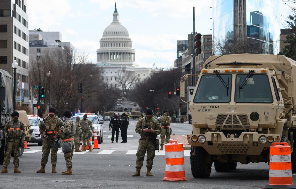 Members of the National Guard stand watch on an intersection in Washington, D.C., on Sunday.