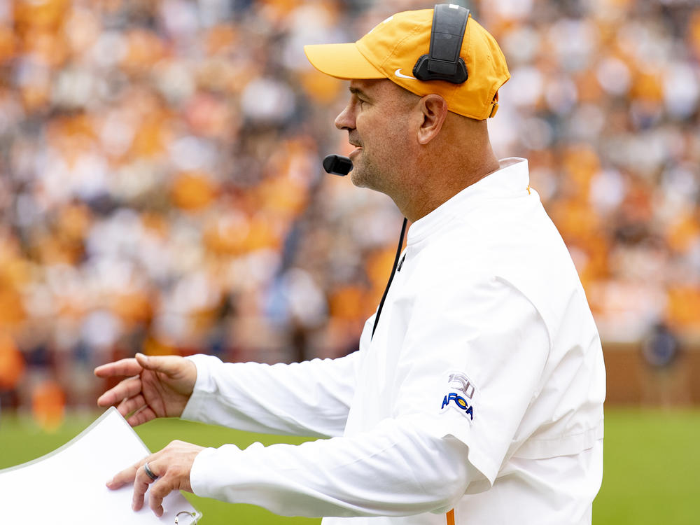 University of Tennessee head football coach Jeremy Pruitt directs players at a game on Oct. 12, 2019. University officials announced they will fire Pruitt and nine football team staff members after an investigation found a slew of likely NCAA violations.