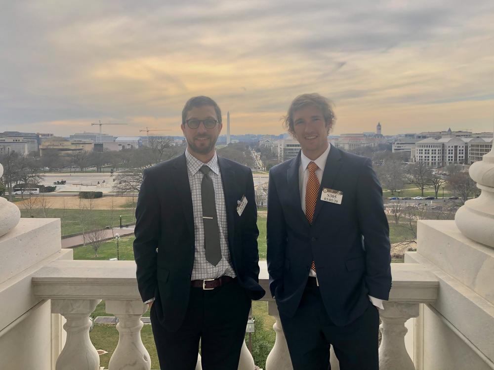 Dustin Kisling, left, and Josh Jesperson, right, at the Capitol building in Washington, D.C., 2020. The two former Navy SEALs advocated for outdoor recreation as an effective treatment for veterans.