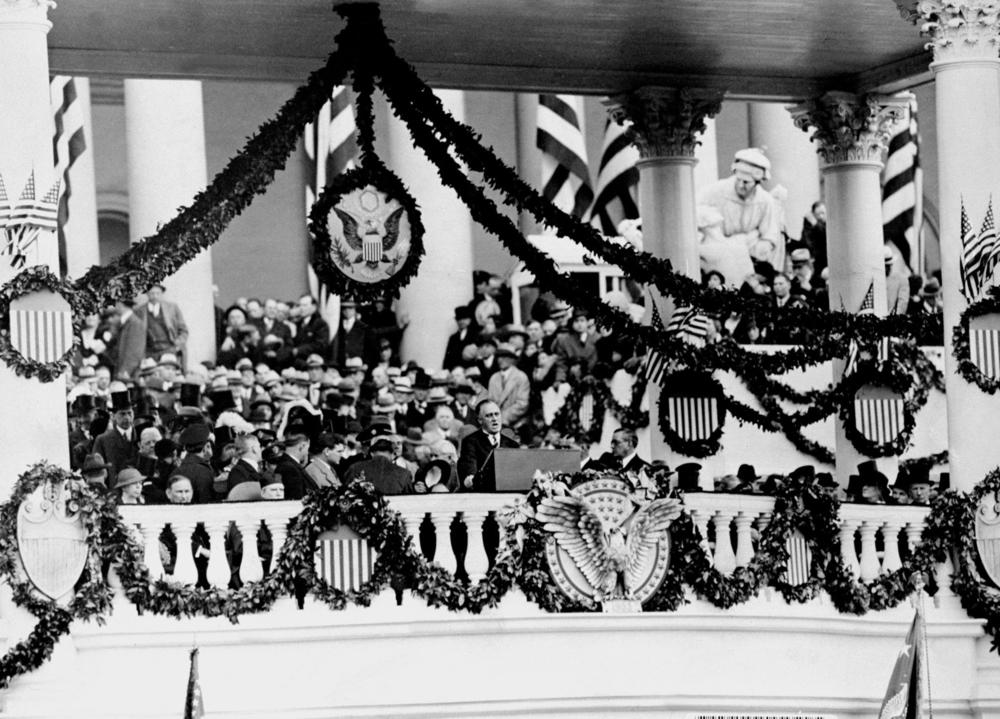 President Franklin D. Roosevelt makes his inaugural address to an audience before the East Portico of the Capitol in 1933.