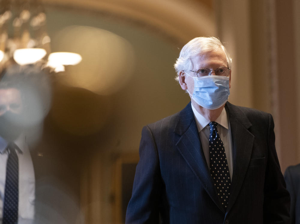 Senate Majority Leader Mitch McConnell, R-Ky., arrives at the U.S. Capitol and walks to his office Jan. 6.