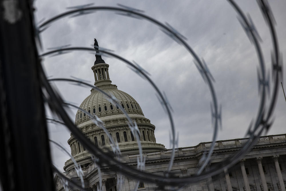 Razor wire is seen last week after being installed on the fence surrounding the grounds of the U.S. Capitol due to security threats.