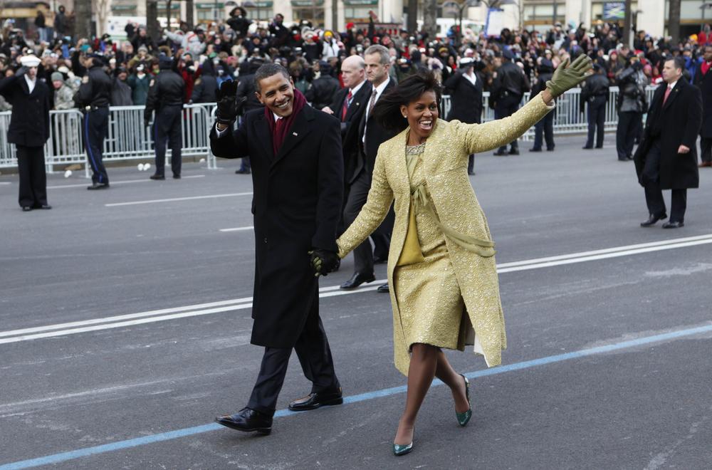 President Barack Obama and first lady Michelle Obama walk the inaugural parade route in Washington, Jan. 20, 2009.