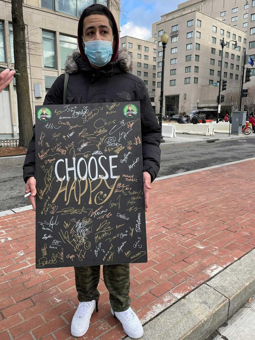 David Hernandez is a cannabis legalization activist from New York. Some people have signed his sign while others have been suspicious of adding their signatures.