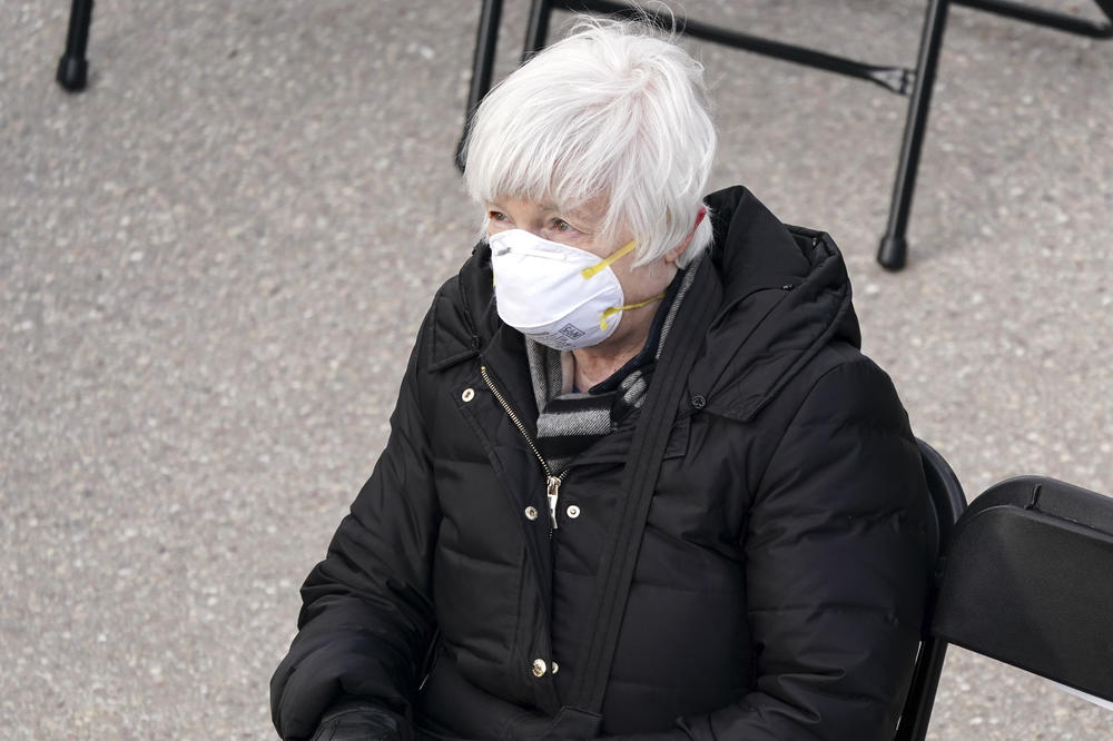 Janet Yellen, U.S. Treasury secretary nominee for President Biden, wears a disposable mask while attending the inauguration.