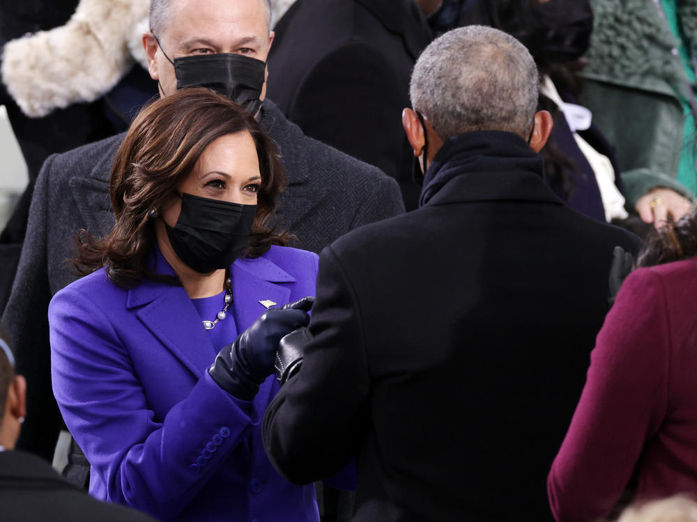 Harris and her husband Doug Emhoff greet former U.S. President Barack Obama as they arrive to the inauguration.