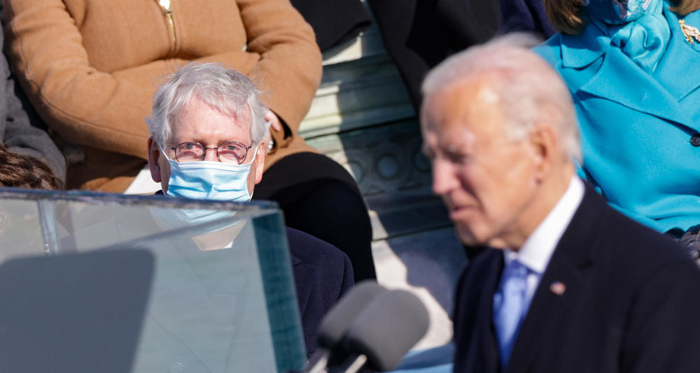 Senate Republican leader Mitch McConnell looks on as President Biden delivers his inaugural address outside the U.S. Capitol on Wednesday.