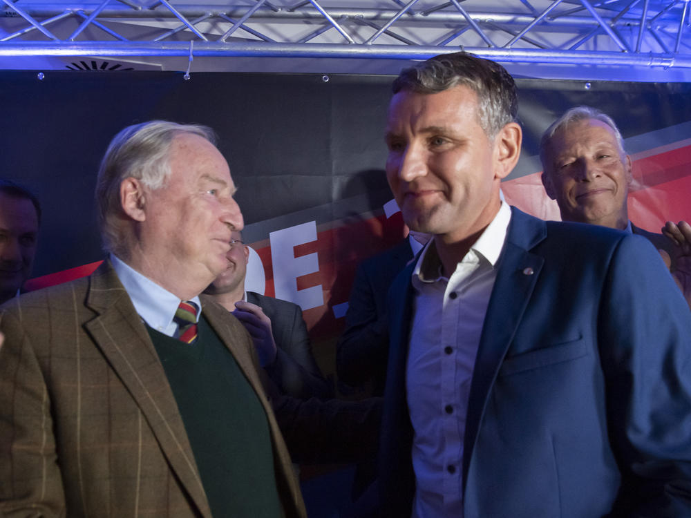 Alternative for Germany leaders Björn Höcke (right) and Alexander Gauland celebrate their party's election results in Erfurt, Germany, in 2019, when voters in Thuringia elected a new state parliament. The AfD now has 88 members in Germany's federal parliament, more than 12% representation.