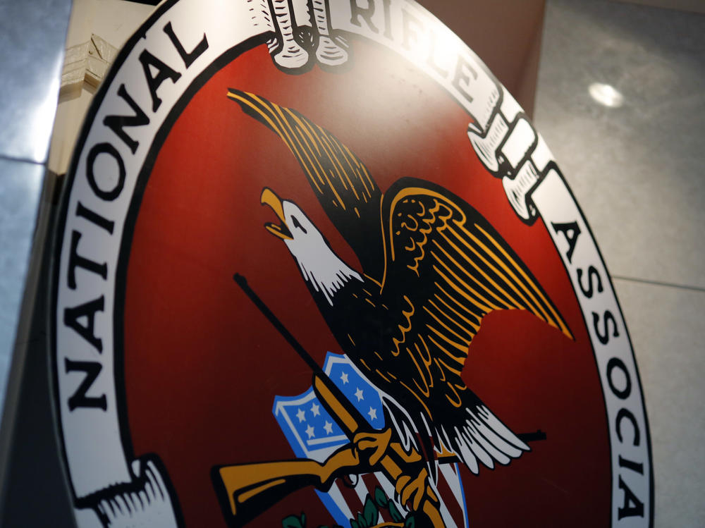 The logo of the National Rifle Association is seen at an outdoor sports trade show in 2017.