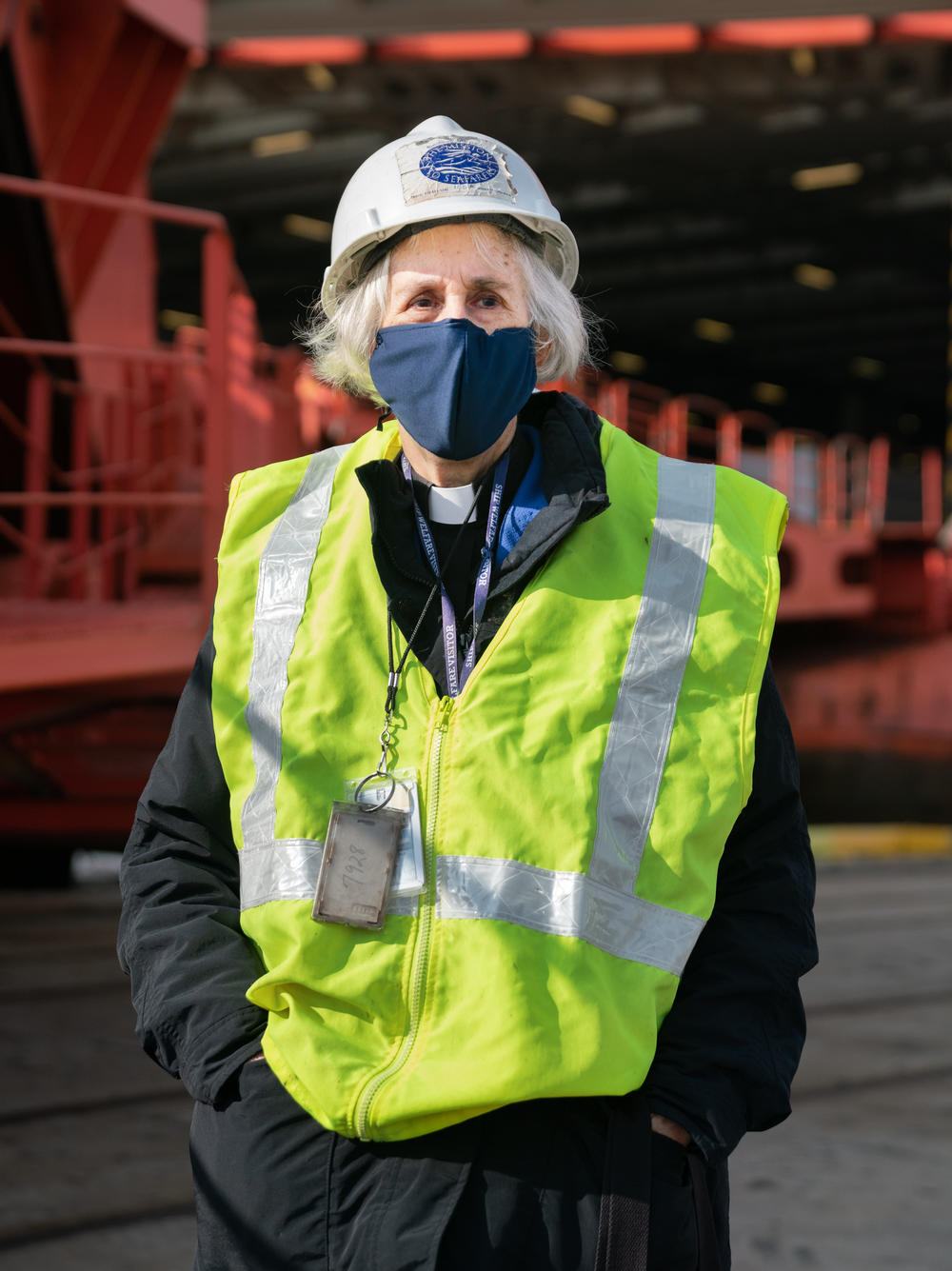 The Rev. Mary Davisson, executive director and port chaplain of the Baltimore International Seafarers' Center, delivers personal items to seafarers who are not allowed off ships.