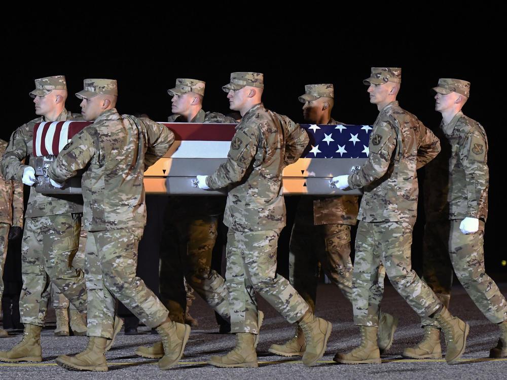 The remains of Lt. Col. Paul  Voss return home, Dover Air Force Base, Del. Voss was one of two Air Force aviators killed in a crash in Afghanistan last January.
