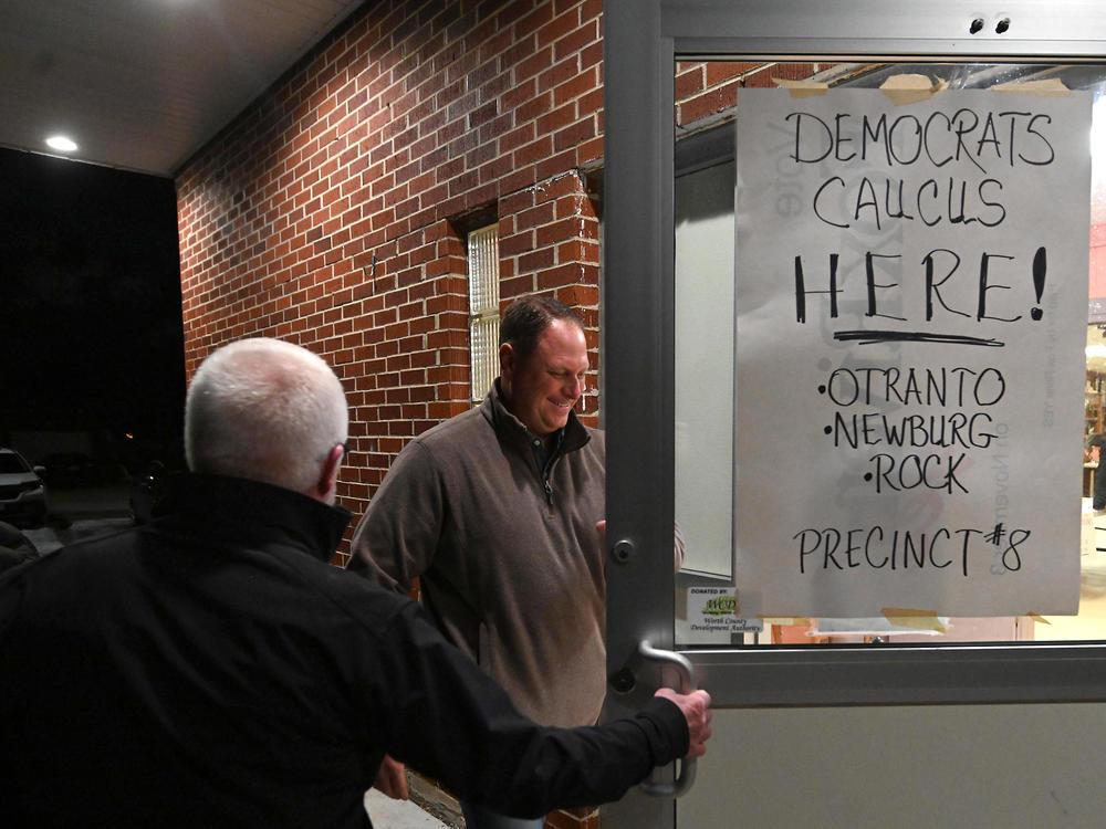Voters head into their Iowa Democratic caucus site last year. Problems with a new smartphone app delayed reporting of the results for days or, for The Associated Press, permanently.