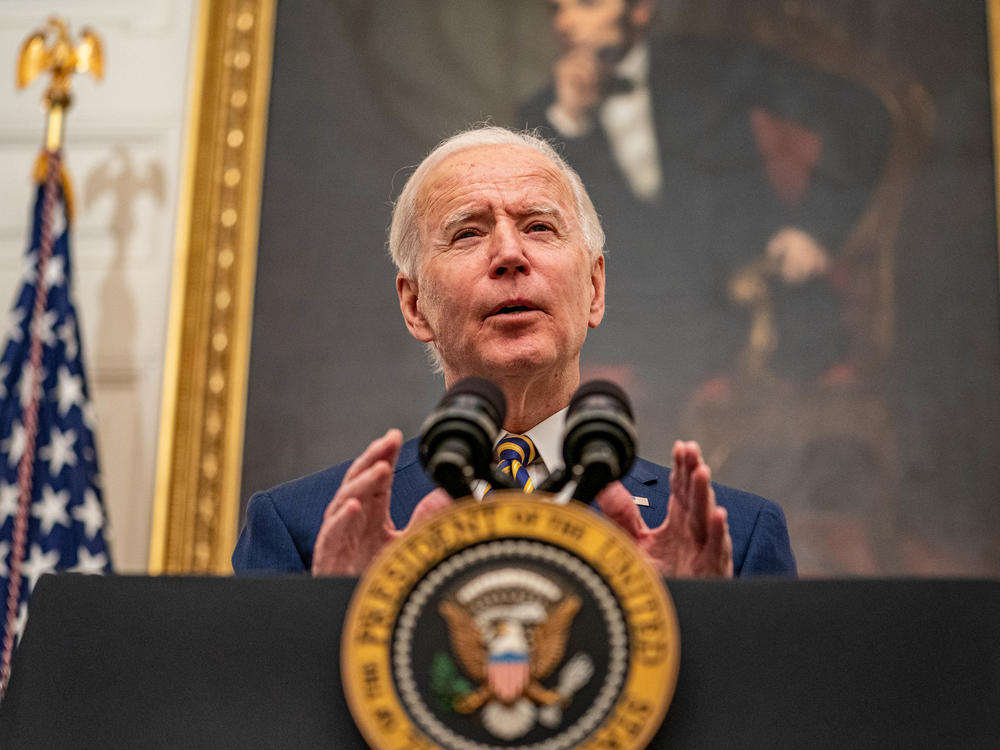 President Biden speaks on his administration's response to the economic crisis in the State Dining Room of the White House on Friday.