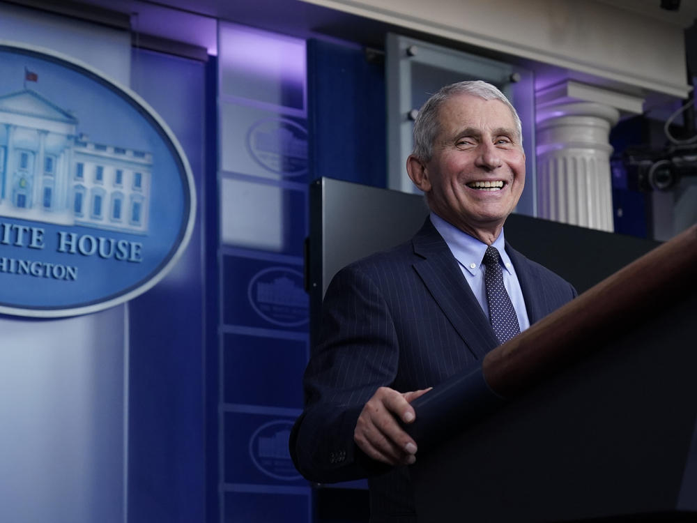 Dr. Anthony Fauci laughs while speaking at a White House briefing on Thursday. Fauci, President Biden's chief medical adviser on COVID-19, says he rejoiced when the new president declared that 