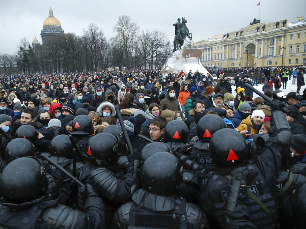 People clash with police Saturday during a protest in St. Petersburg, Russia, against the jailing of opposition leader Alexei Navalny.