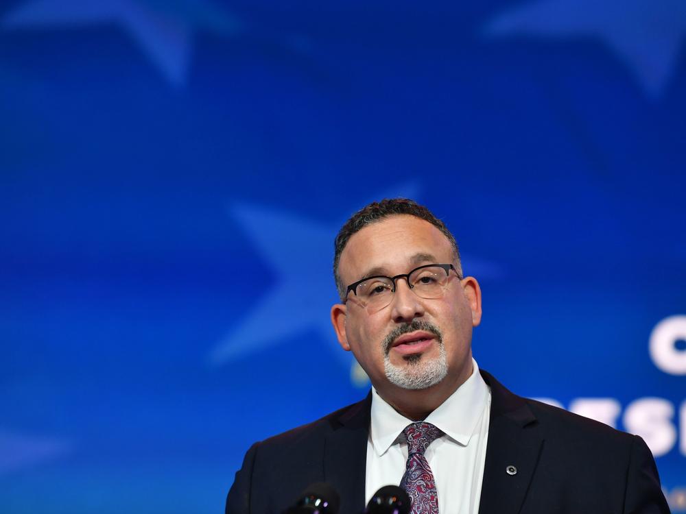 Miguel Cardona, President Biden's nominee for U.S. education secretary, speaks during a December event announcing his nomination.