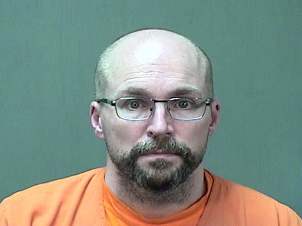 Steven Brandenburg at the Ozaukee County Sheriff's Office Monday, in Port Washington, Wis. Brandenburg agreed to plead guilty to two charges of of attempting to tamper with consumer products with reckless disregard for the risk that another person will be placed in danger of death or bodily injury, prosecutors say.