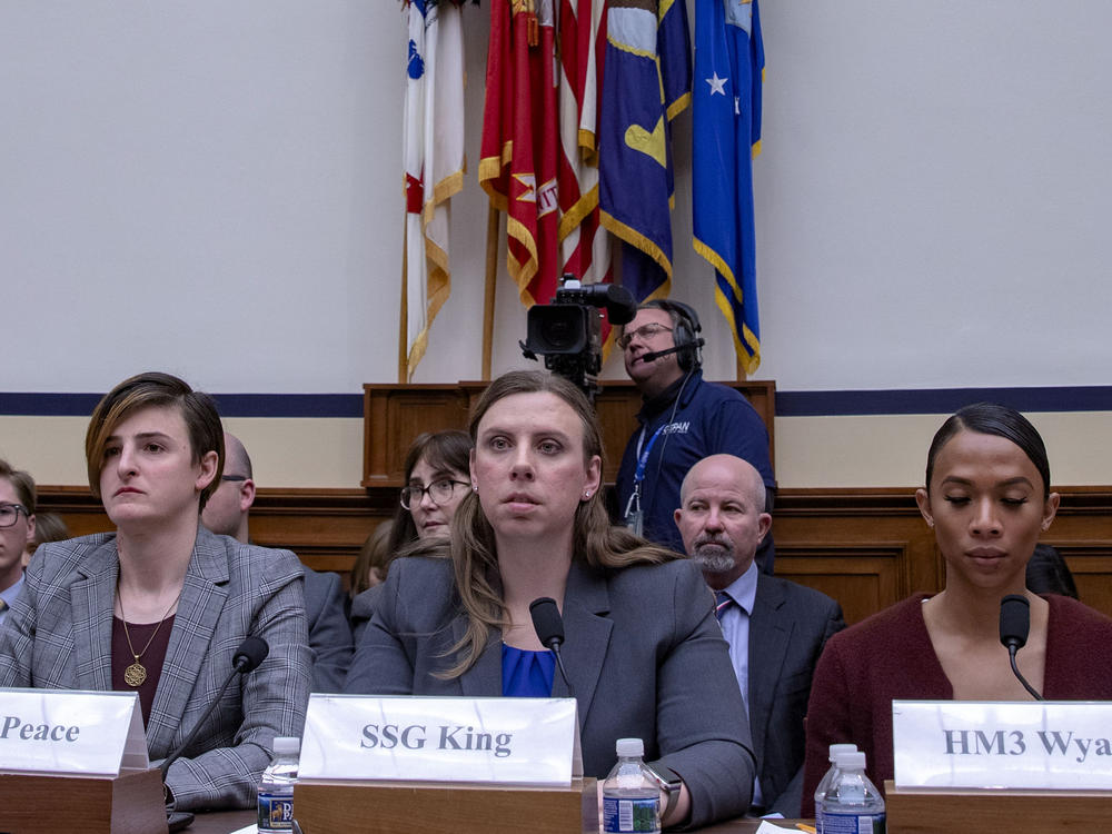 Army Capt. Jennifer Peace, Army Staff Sgt. Patricia King (center) and Navy Petty Officer 3rd Class Akira Wyatt attend a hearing on Transgender Service Policy on Capitol Hill in 2019. King and other trans troops have long fought for the right to serve openly prior to Trump's ban, and she hopes there is more legislation to follow Biden's repeal to ensure something like that does not happen again.