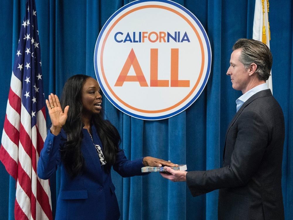 California's first surgeon general, Dr. Nadine Burke Harris, is sworn in by Gov. Gavin Newsom in February 2019. A leading voice on health care equity, she's helping shape the state's vaccination makeover following its rocky start.