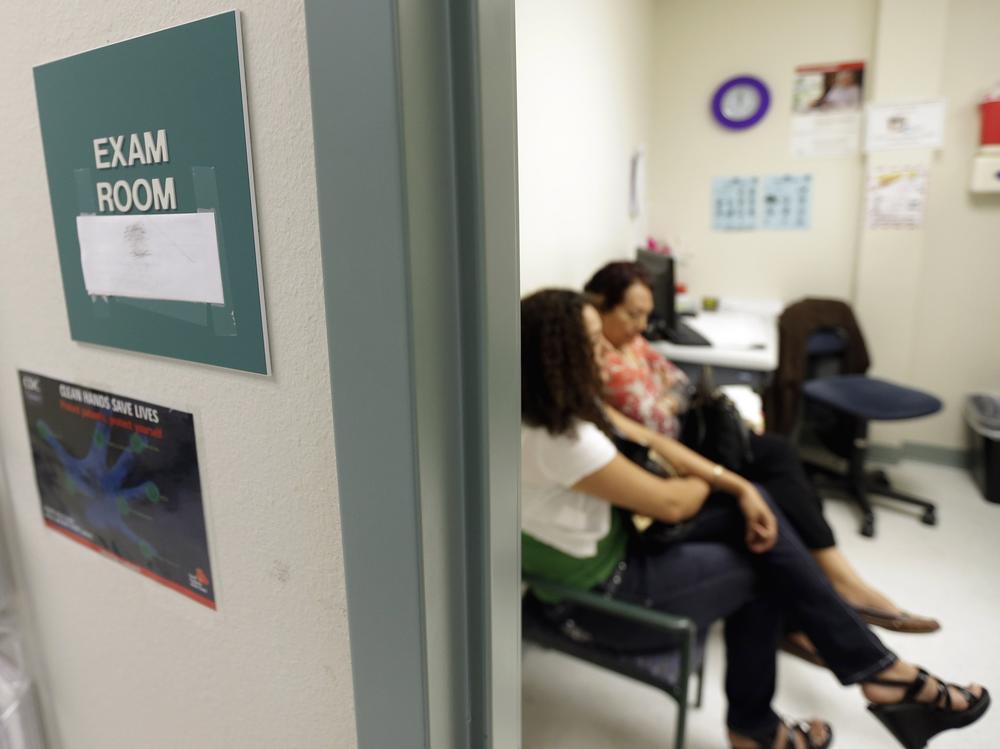 President Biden signed an executive action Thursday that revokes a Trump-era policy cutting funds to global organizations that offer abortion and to expand access to health insurance.