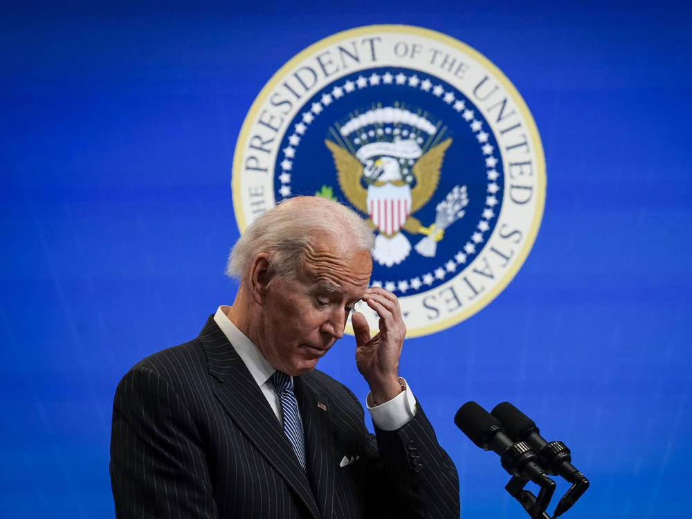 President Biden pauses while speaking after signing an executive order related to manufacturing, at the White House on Monday. Biden is off to a fast start but is running into resistance in Congress.