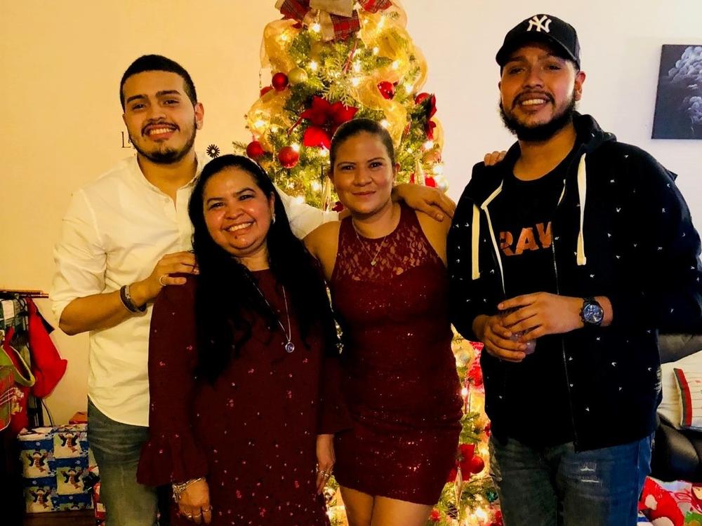Javier Maradiaga (far right) with his brother, Jason Castillo; mother, Alma Maradiaga; and sister, Dariela Moncada on Christmas Eve in 2017.
