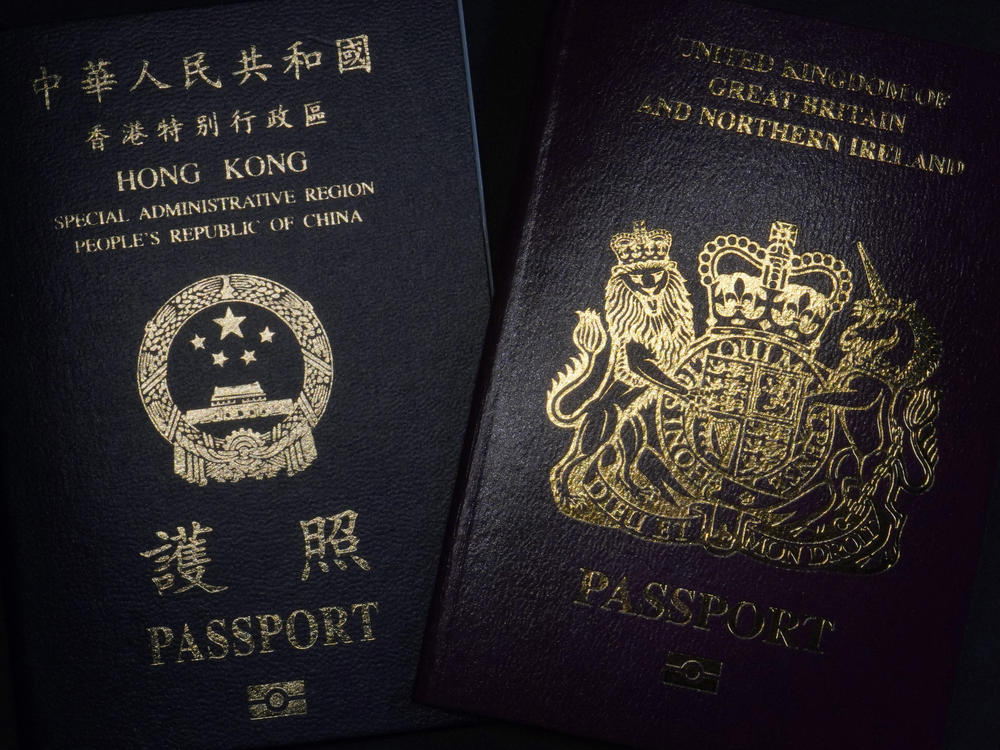 A British National Overseas passport (right) and China's Hong Kong Special Administrative Region passport. China said Friday it will no longer recognize the BNO passport as a valid travel document or form of identification.