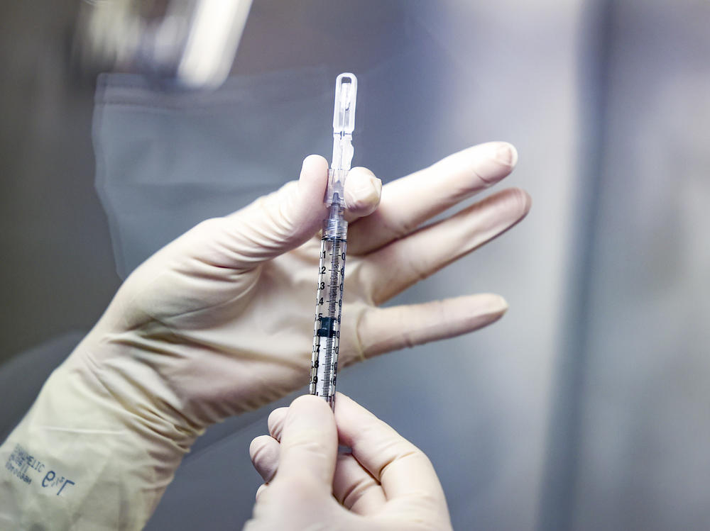 The Johnson & Johnson COVID-19 vaccine, pictured in December, is 66% effective at preventing moderate and severe disease. But Dr. Paul Stoffels of Johnson & Johnson says what matters more is preventing hospitalizations and deaths, which it did completely.