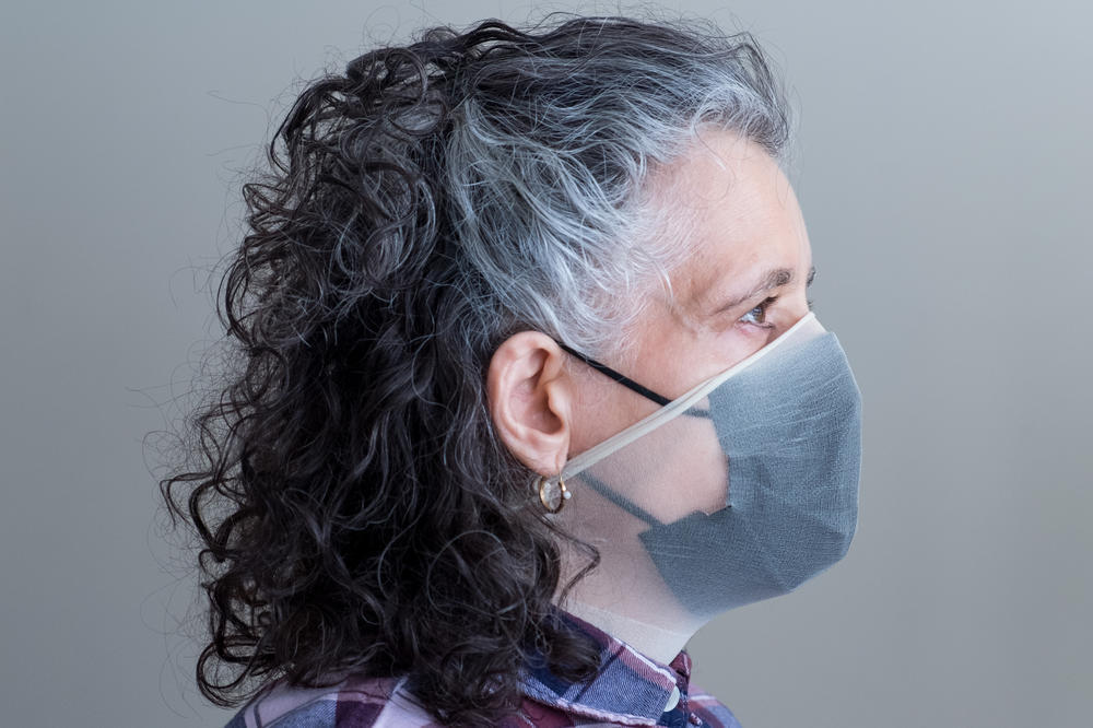 If you want to try the pantyhose trick, cut a<strong> </strong>ring of material, about 8 to 10 inches top to bottom, from one leg on a pair of pantyhose. Then pull the ring over your head and on top of your mask to create a tight fit to the face.