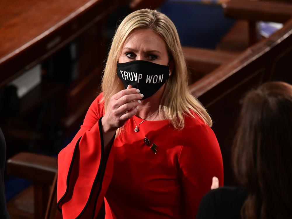 Rep. Marjorie Taylor Greene, R-Ga., wears a 