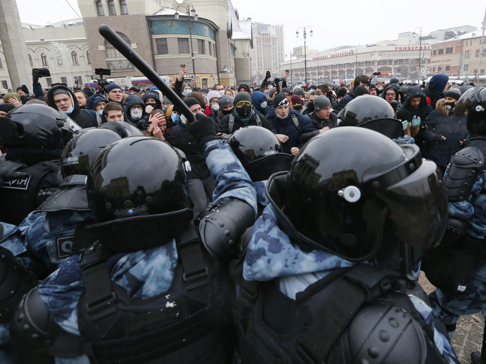 Demonstrators in Moscow clash with police Sunday during a protest against the jailing of Alexei Navalny. Thousands of people took to the streets across Russia to demand the opposition leader's release.