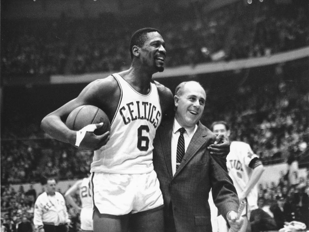 Bill Russell with longtime Boston Celtics head coach Red Auerbach. When Auerbach retired he named Russell to take his place, making him the first Black head coach in the NBA.