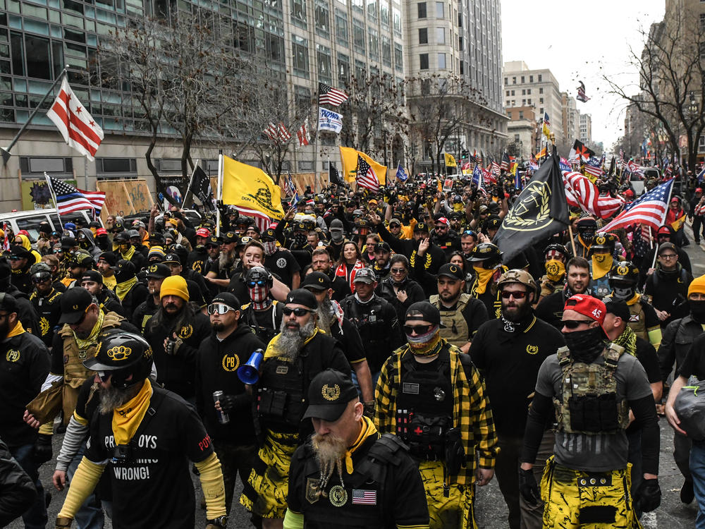 Members of the Proud Boys march toward Freedom Plaza during a protest in December 2020 in Washington, D.C. The Proud Boys has been designated as a hate group by the Southern Poverty Law Center.