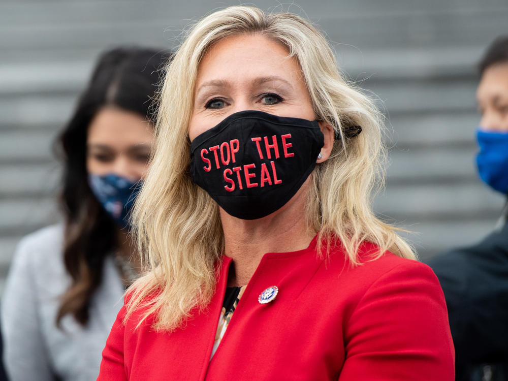 Rep. Marjorie Taylor Greene, R-Ga., pictured on Jan. 4, is facing blowback from other members of Congress, including in her own party, for her extreme and baseless theories surrounding American politics.