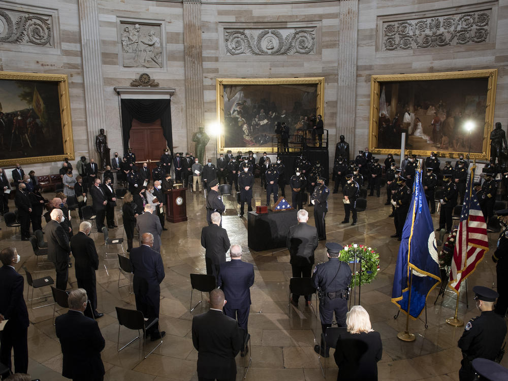 A funeral service for Capitol Police Officer Brian Sicknick as he lies in honor in the Rotunda of the U.S. Capitol Wednesday. Sicknick died as a result of injuries he sustained during the Jan. 6 attack on the U.S. Capitol.