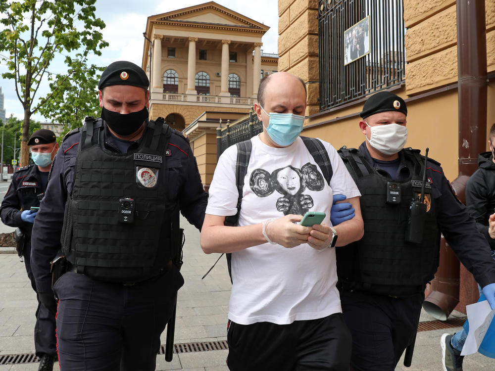 Sergei Smirnov, pictured being detained at a 