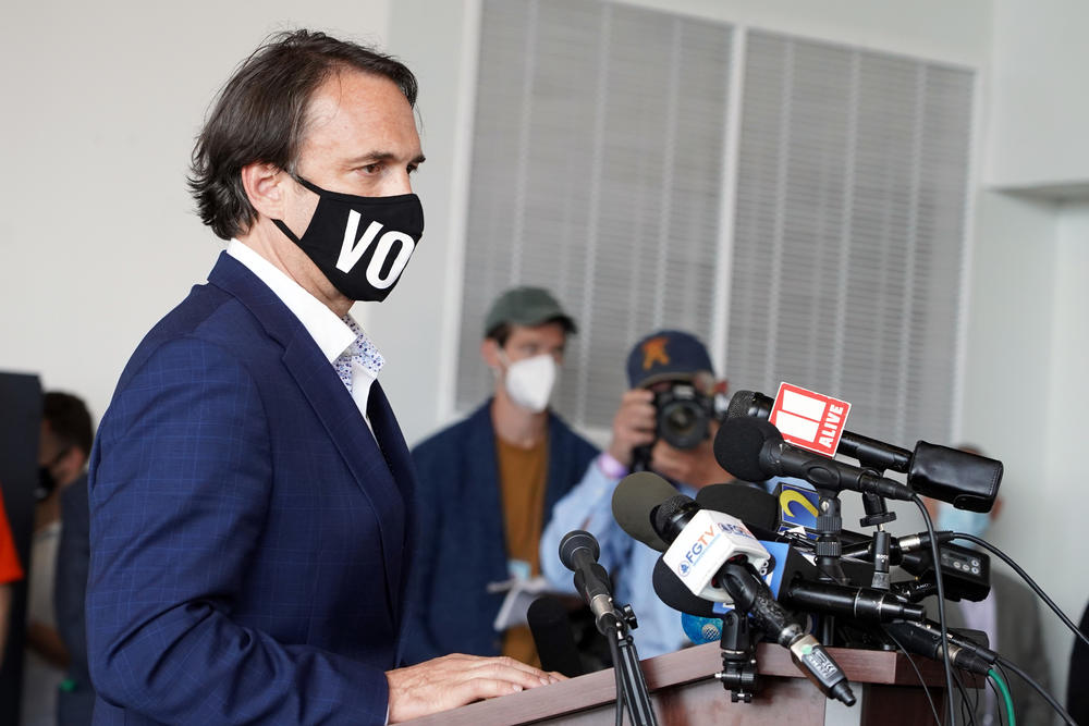 Fulton County Elections Director Rick Barron speaking to reporters on Nov. 5, 2020. Barron now questions the meaning of his job after the disinformation campaign launched against his office. 