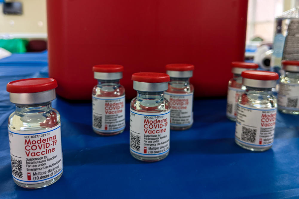 Vials of the Moderna COVID-19 vaccine thaw before being administered to residents and staffers at the Brian Center/Cabarrus nursing home in Concord, N.C.