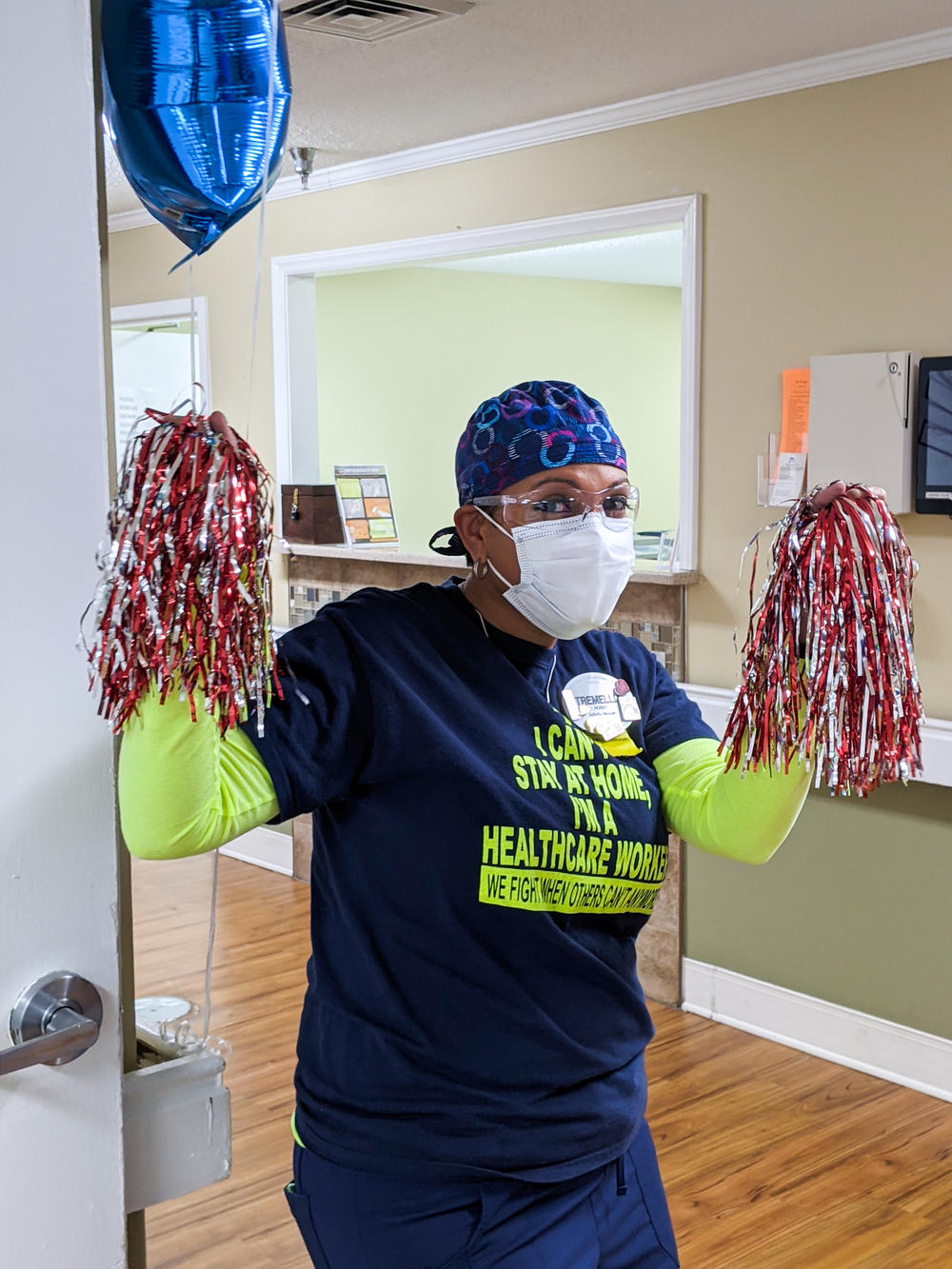 Tremellia Hobbs, activities director at the Brian Center/Cabarrus nursing home, cheers on her co-workers as they receive COVID-19 vaccines on Jan. 14, 2021.