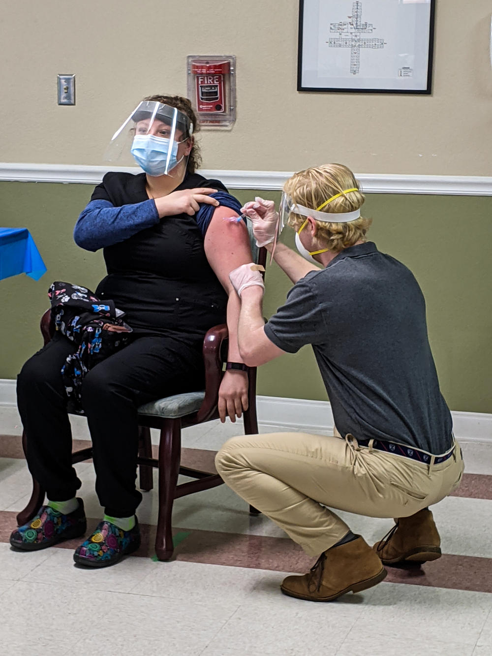 Josiah Howard (right) was one of two CVS pharmacists who administered the Moderna COVID-19 vaccine to staff members and residents at the Brian Center/Cabarrus nursing home on Jan. 14, 2021.