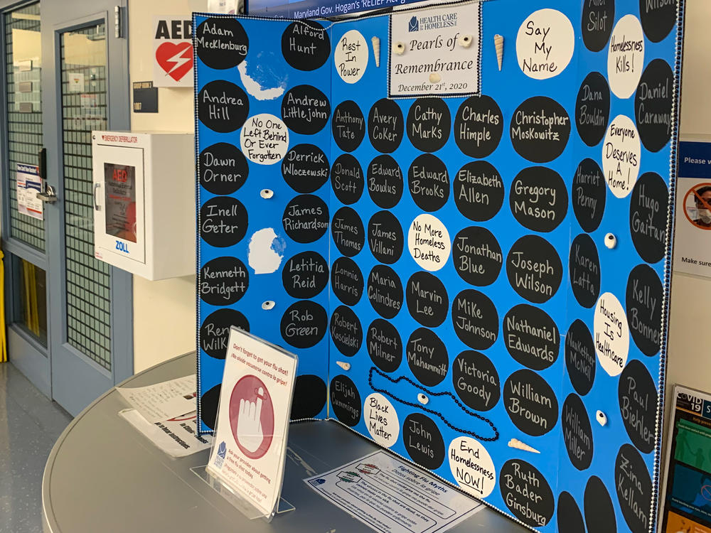 A poster memorializes recently deceased clients of Health Care for the Homeless in Baltimore. Among the clinic's 157 patients who died last year, says CEO Kevin Lindamood, COVID-19 was not the leading killer. 