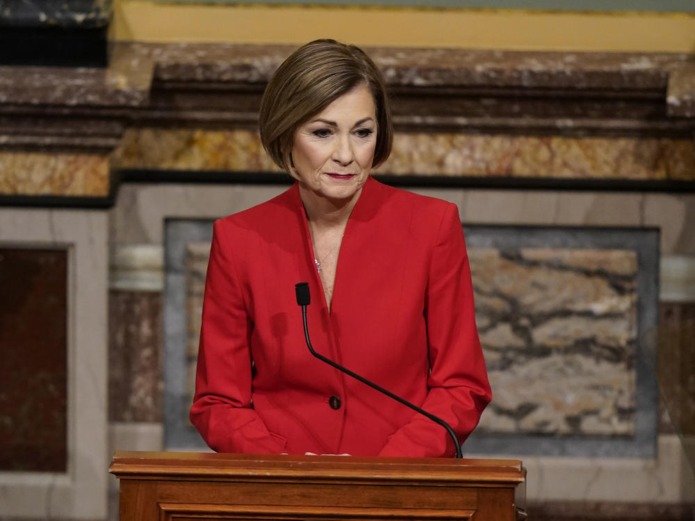 Iowa Gov. Kim Reynolds, seen in January, issued a new public health disaster proclamation Friday that eliminates most of the state's coronavirus restrictions including mask and social distancing guidelines.
