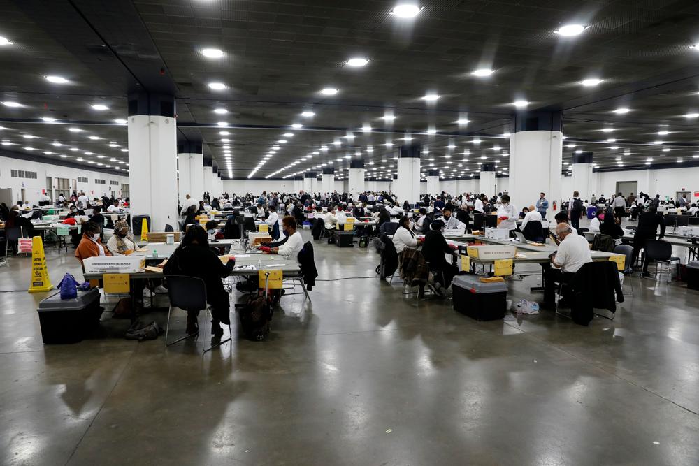 Election workers count absentee ballots for the 2020 general election on Nov. 4 at TCF Center in Detroit.