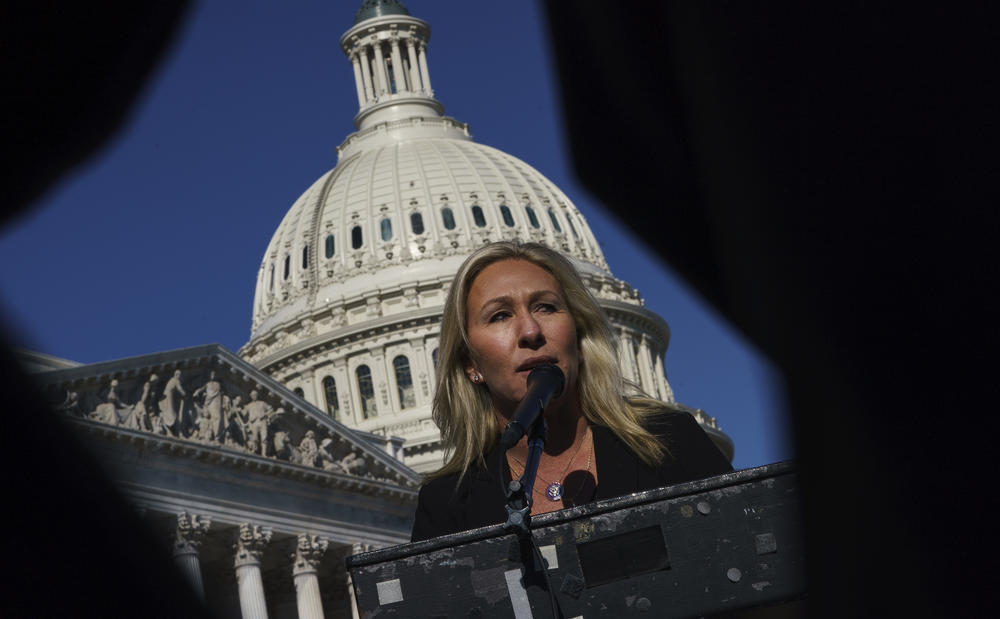 Rep. Marjorie Taylor Greene, R-Ga., speaks during a press conference outside the U.S. Capitol Friday after she was stripped of committee assignments.