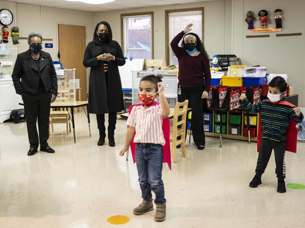 Mayor Lori Lightfoot (left) and Chicago Public Schools CEO Janice Jackson (second from left) visit a preschool classroom at Dawes Elementary School in Chicago on Jan. 11.