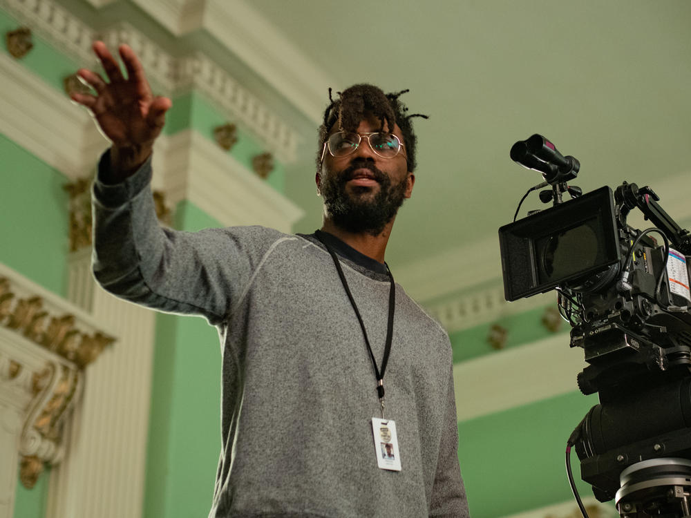Director Shaka King on the set of<em> Judas and the Black Messiah.</em> The film<em> </em>chronicles the life of Illinois Black Panther Party leader Fred Hampton through the eyes of William O'Neal — the man who infiltrated the group on behalf of the FBI.