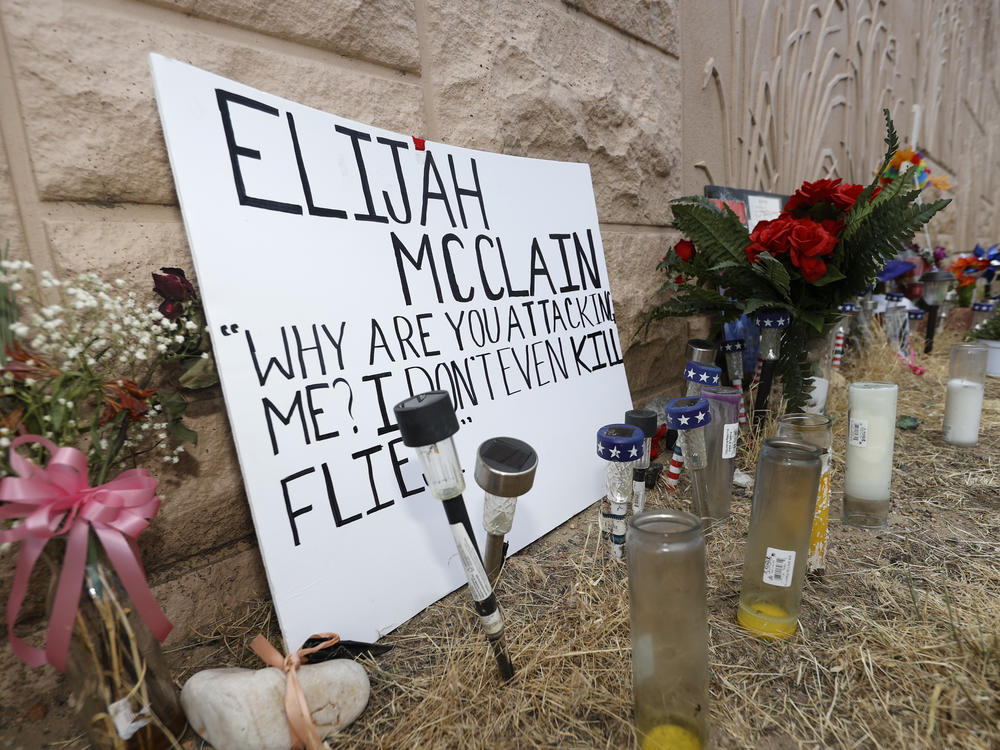 Three Aurora Police Department officers were fired in connection with staged photos wherein one officer held another in an apparent carotid restraint hold. That move was used to subdue Elijah McClain before he died.