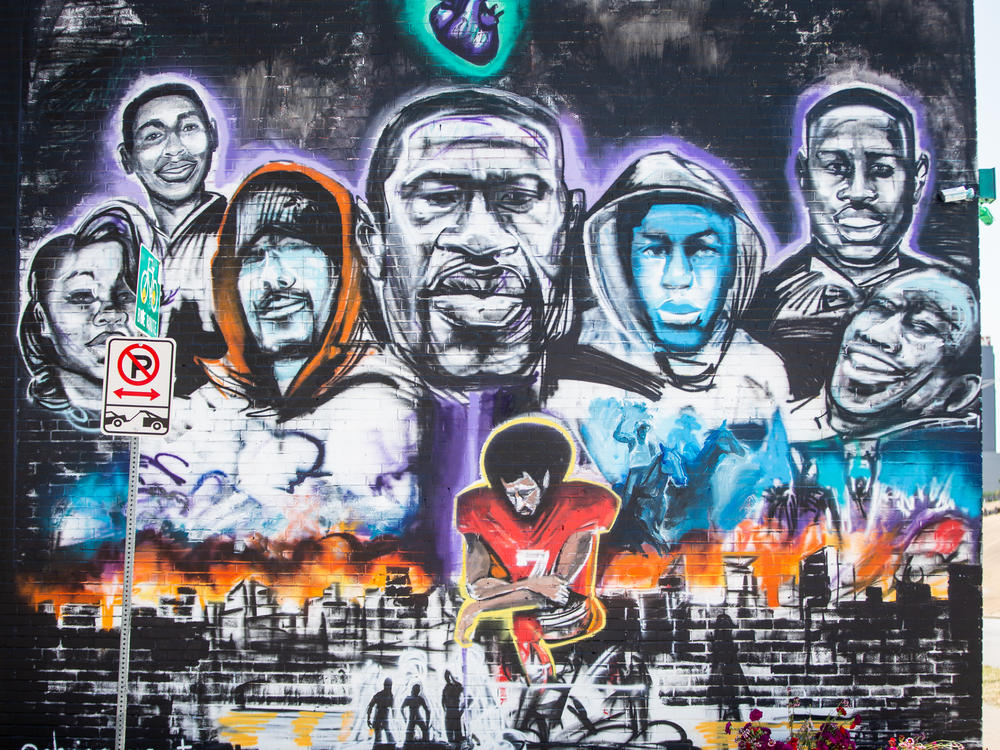 A mural honoring George Floyd and the larger Black Lives Matter movement is pictured on a wall of Native Hostel. It was created by local artist Chris Rogers.