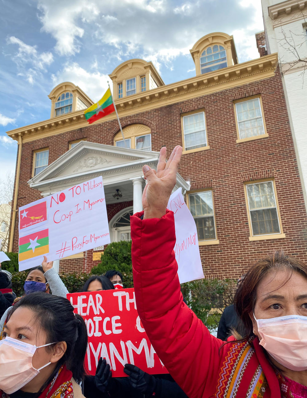 A demonstrator holds up the 